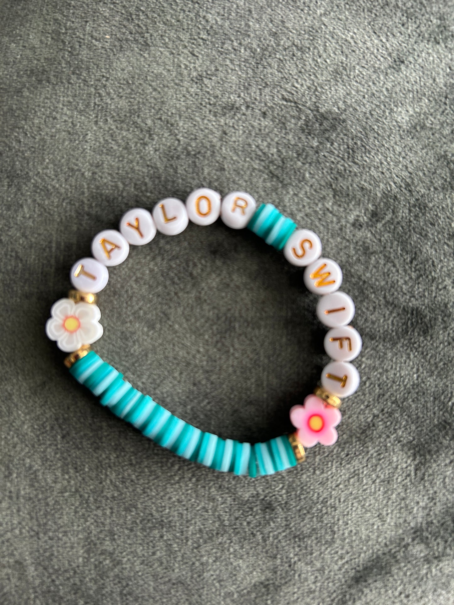 Aqua Marine ‘TAYLOR SWIFT’ Bracelet with floral charms