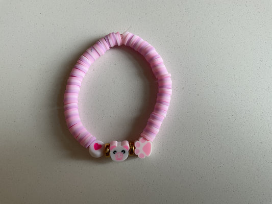 Pastel pink children’s piggy bracelet